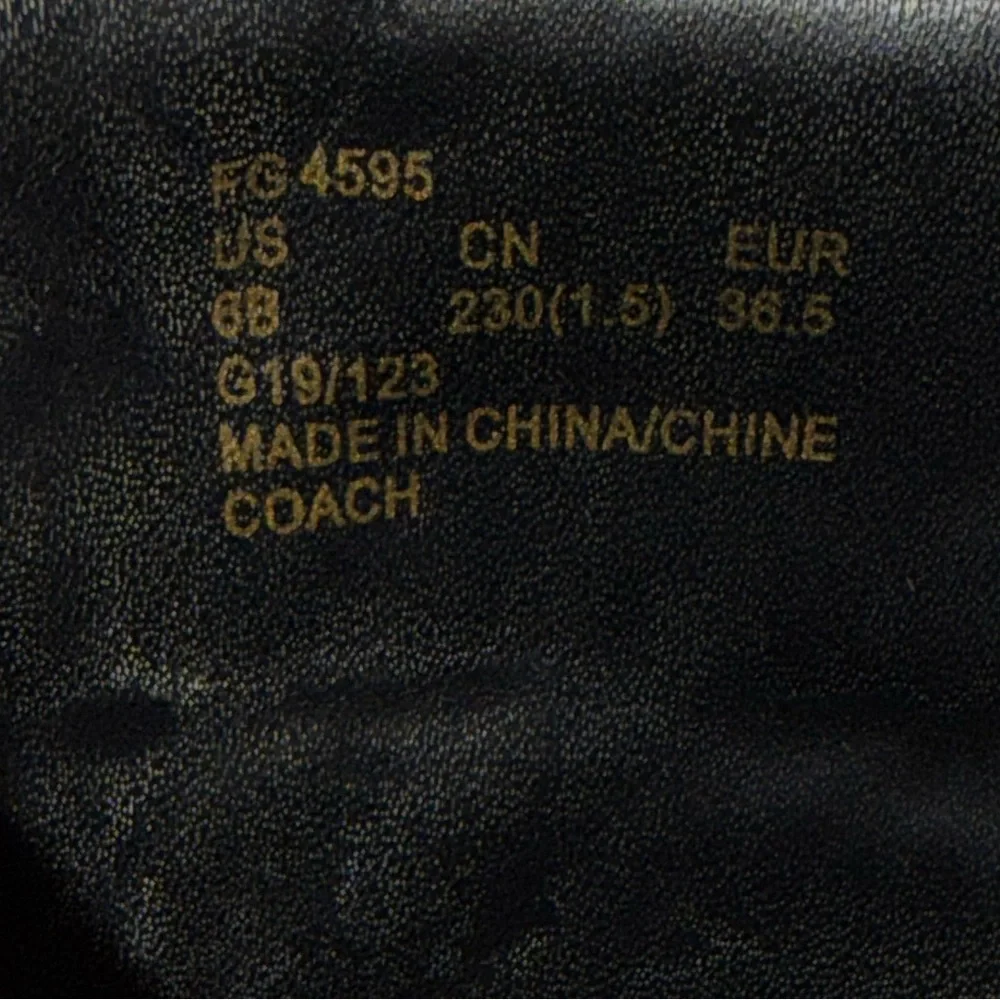 Coach Ivory Lace-Up Boots with Black Accents